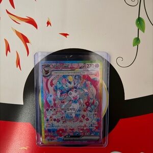 Pokemon Card with Blue and Pink Accents